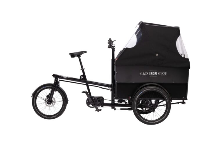 Right side view of the Black Iron Horse OX cargo bike with the rain cover up