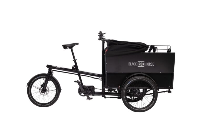 Right side view of the Black Iron Horse OX cargo bike with the rain cover down
