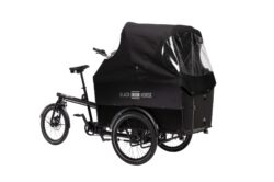 Front right view of the Black Iron Horse OX cargo bike with the rain cover up