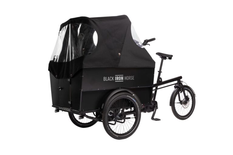 Front view of the Black Iron Horse OX cargo bike with the rain cover up